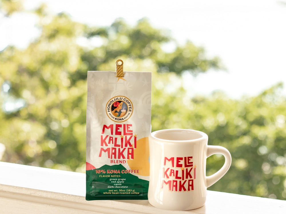 A bag of Mele Kalikimaka coffee blend and holiday diner mug