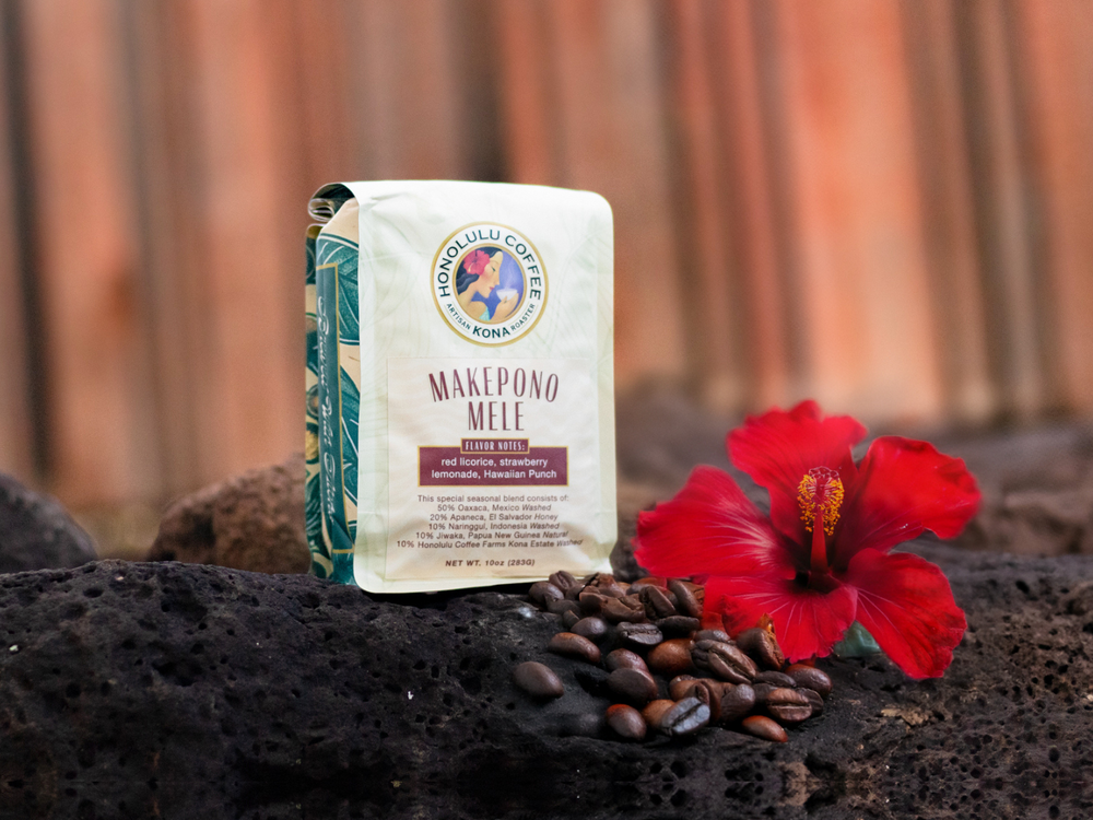 10oz bag of Makepono Mele coffee blend with coffee beans and a hibiscus flower