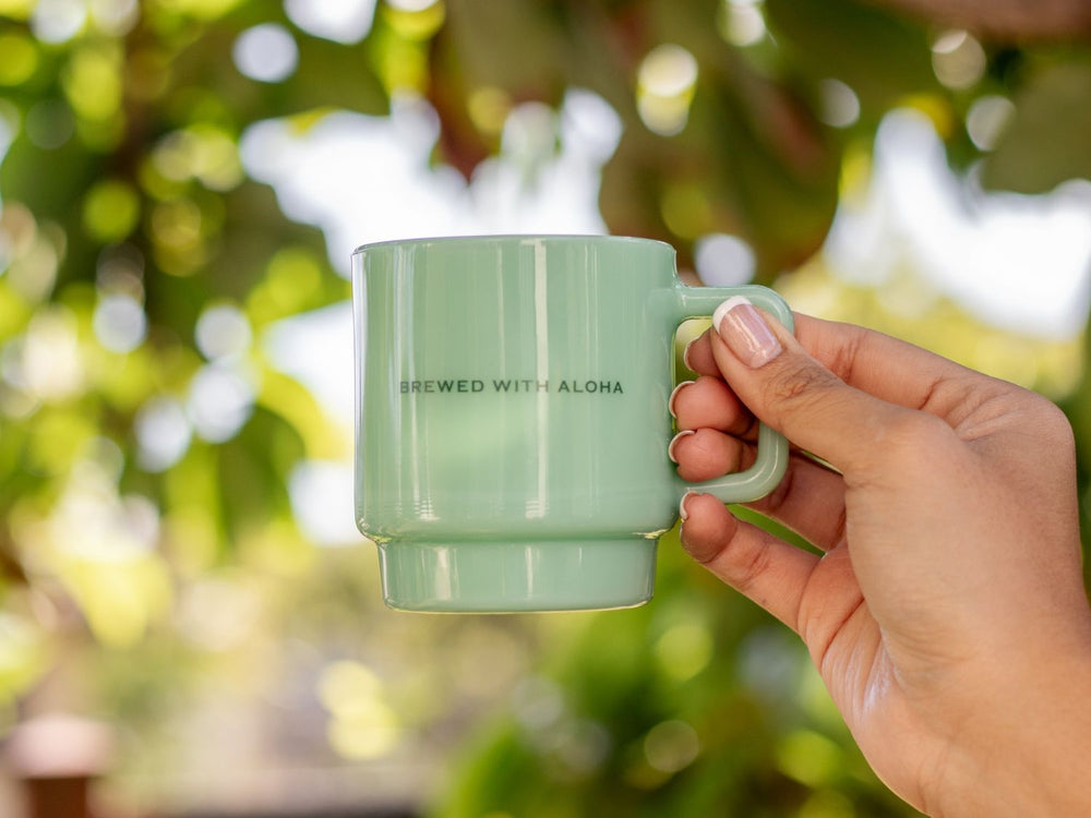 
                  
                    Green Milk Glass Mug with "Brewed with Aloha" tagline
                  
                