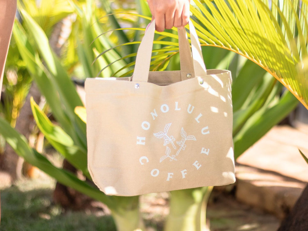 
                  
                    Mini tote with Honolulu Coffee's coffee branch design
                  
                